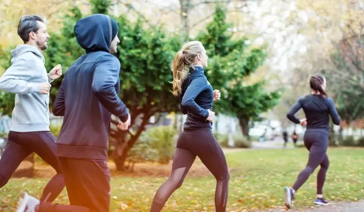 people running together in a park