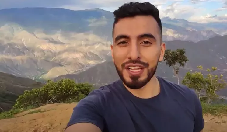 Young man recording video