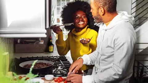 two women eating Maggi noodles