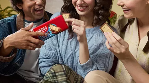 three are funny biting the chocolate
