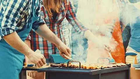 People cook meat