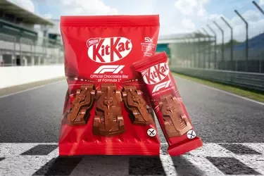 KitKat racing edition chocolate pack displayed on a racetrack finish line