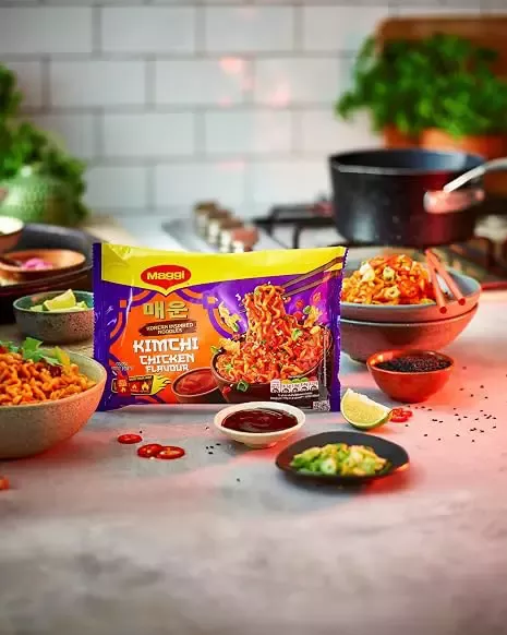 MAGGI Kimchi Chicken instant noodles served with spicy Korean-inspired side dishes