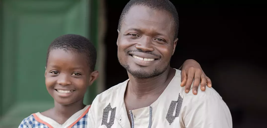 cocoa farmer with daughter
