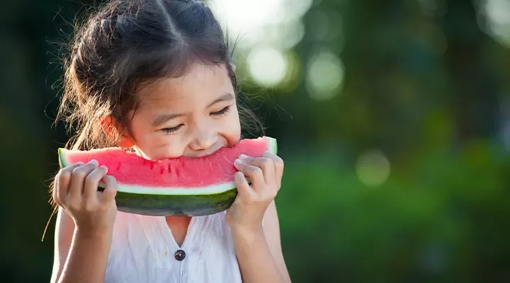 Child eating watermelon