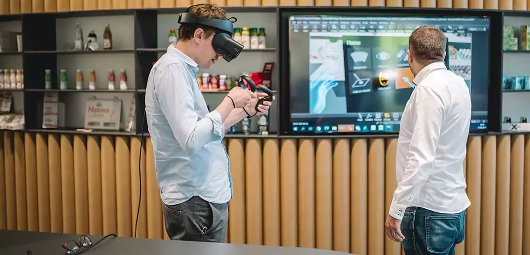 Two man using VR tools for work
