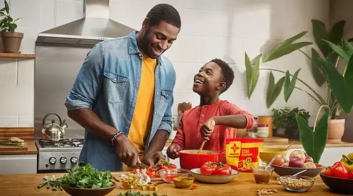 Mother and daughter are cooking with Ninho