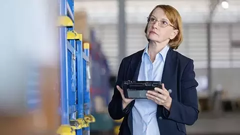 Female auditor doing checks