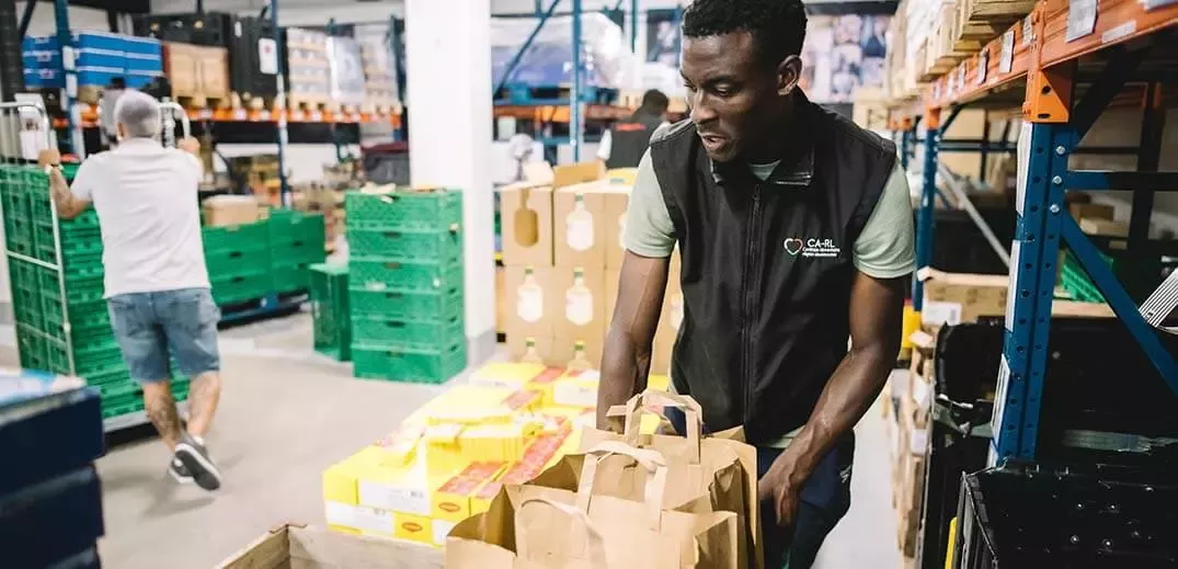 Worker making food supplies