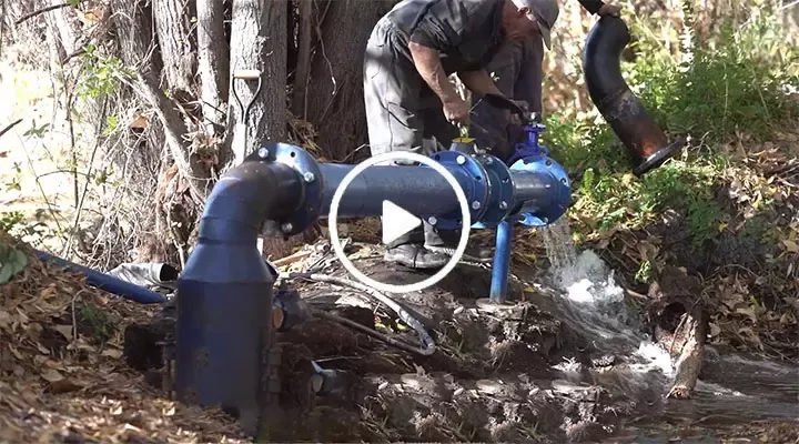 a man fixing the pump