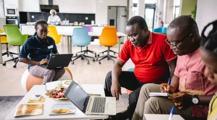 People around the board