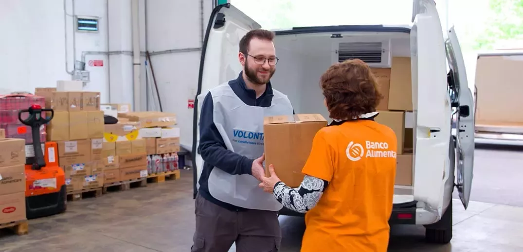 volunteer delivers a parcel