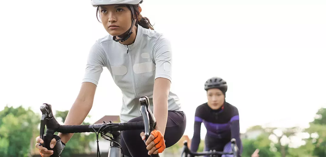 Young people riding bike professionally