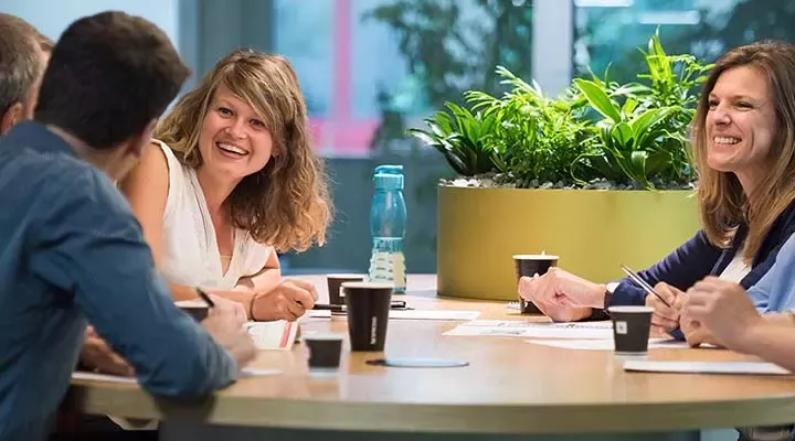 People are drinking coffee at work