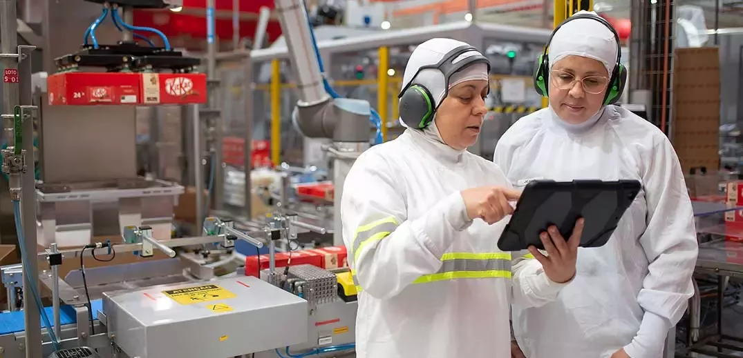 workers are checking tablet