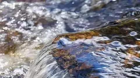 Flowing water over rocks.