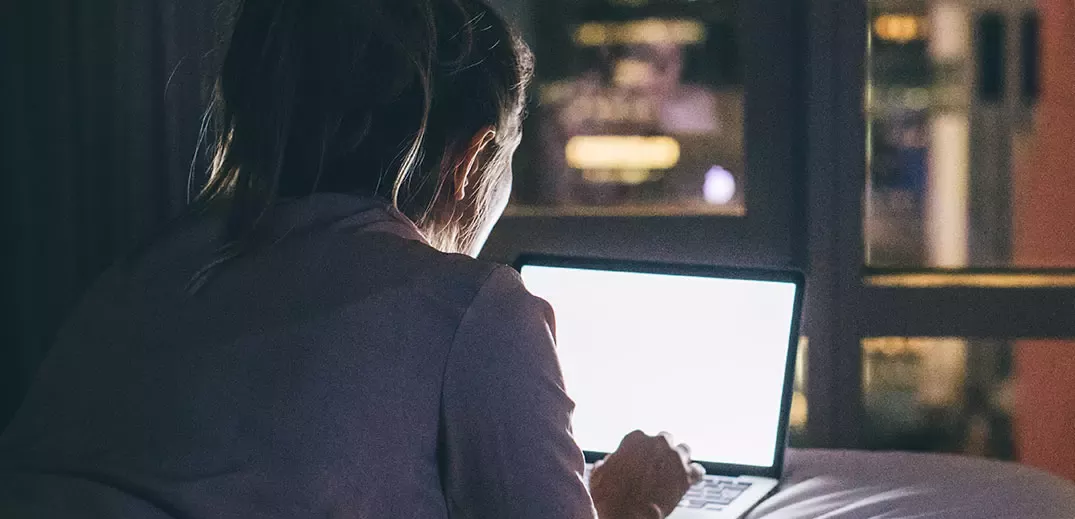 young person with laptop