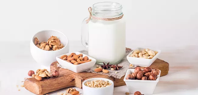 vegan milk from nuts in glass jar