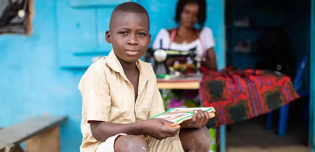 Boy holding book
