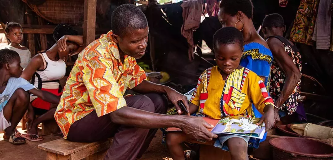boy and man reading