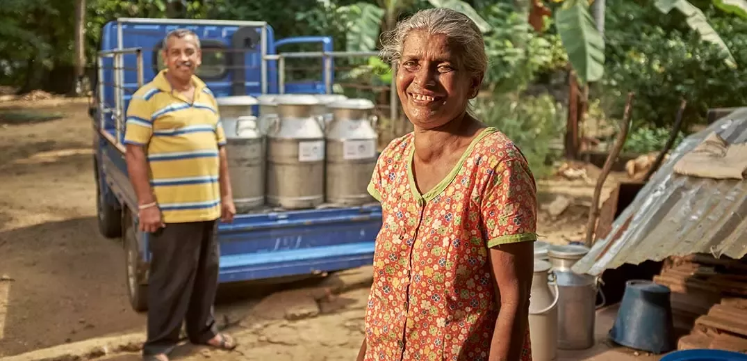 Female dairy farmer in Sri Lanka