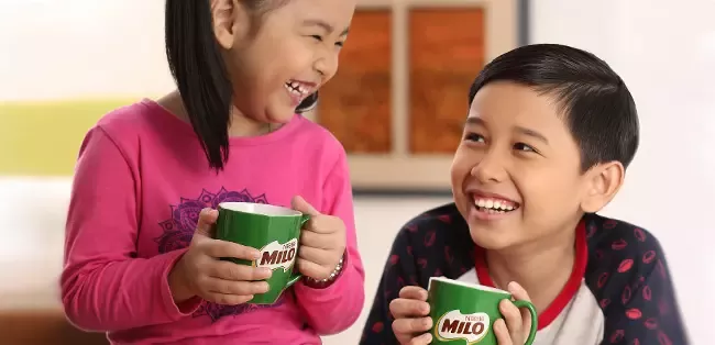 children drinking Milo
