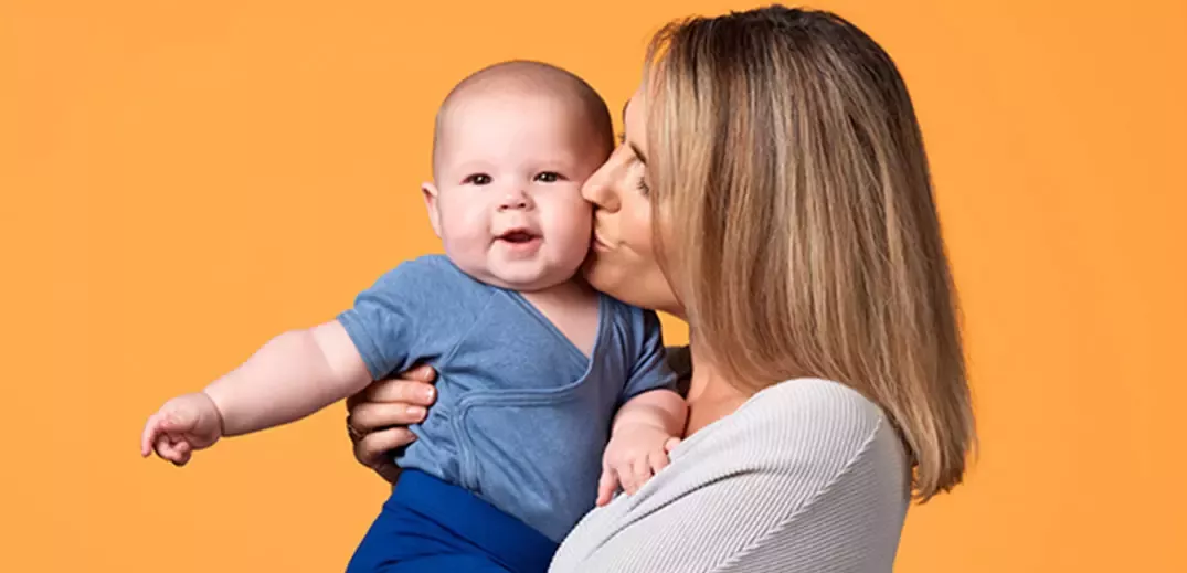mother holding child