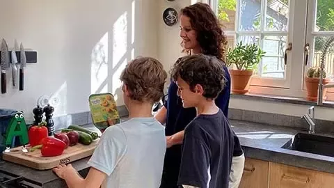 Mom and boys are cooking